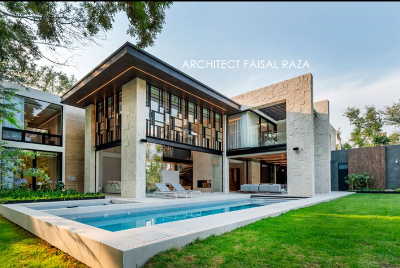 Grand neoclassical villa with golden lighting by Faisal Raza Architect